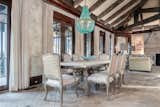 Dining Room, Pendant Lighting, Table, Travertine Floor, and Chair  Photo 8 of 17 in Ono Island by Mike Zarella