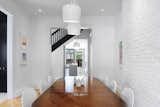 Dining Room, Chair, Table, Ceiling Lighting, and Light Hardwood Floor Dining Room   Photo 2 of 10 in (re) Edwardian House by Post Architecture Inc. by sanam