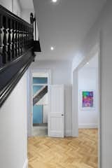 Hallway and Light Hardwood Floor Wallpaper in the Powder Room  Photo 8 of 10 in (re) Edwardian House by Post Architecture Inc. by sanam