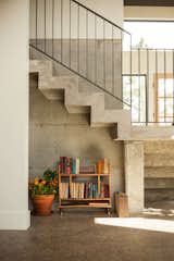 The custom concrete floating staircase was one of the most challenging aspects of the home, but also one of Luke's favorite elements.