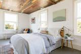 Bedroom 2...gorgeous natural light . The whole second floor original ceiling was uncovered during the renovation and kept as a feature