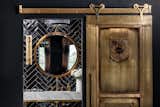 Solid Brass rolling barn door: Designed by Garret & Garage 

Shefa Family crest emblem designed by Lori & Abe’s oldest son, Mason Shefa.

Pendant round mirror Restoration Hardware
