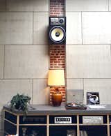 Exposed brick and a 1970s sound system add to Proud Mary's homey vibe.