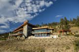 Okanagan materials clad the exterior of the home and beautifully complement the landscape.