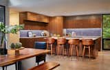 Kitchen, Granite Counter, Wood Cabinet, Recessed Lighting, Accent Lighting, Undermount Sink, Medium Hardwood Floor, and Ceramic Tile Backsplashe  Photos from Kessler Residence