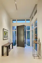 Front Entry featuring custom steel door.