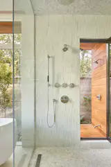 Master Bathroom shower with access to the outdoor shower.
