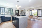 Kitchen, Ceiling Lighting, Drop In Sink, Medium Hardwood Floor, Marble Counter, and Recessed Lighting Kitchen  Photo 4 of 21 in Grand 1920's Spanish Estate by Courtney + Kurt Real Estate Team