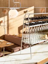 Dining Room, Pendant Lighting, Wall Lighting, Table, Bar, and Bench  Photo 4 of 6 in Vancouver’s Savio Volpe Is a Playful New Take on the Italian Osteria