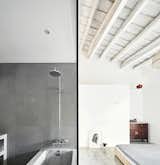 Bath Room, Open Shower, Recessed Lighting, Alcove Tub, and Concrete Wall  Photos from Can This Renovated, Loft-Like Home in Spain Be Any Dreamier?