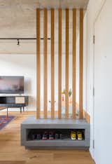 King West Loft by SOCA built-in bench and shoe cubby