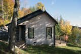 Exterior, Cabin Building Type, Wood Siding Material, Metal Roof Material, Saltbox RoofLine, and House Building Type Natural materials - Wood and slate  Photos from Wentworth Cabin