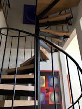 spiral staircase with Michael Weber painting