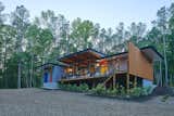 The cypress "veil" makes a clear separation between the porch and the street elevation.