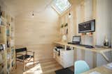 Office, Light Hardwood Floor, Study Room Type, Chair, Desk, Shelves, Lamps, and Bookcase  Photo 4 of 10 in This Architect’s Tiny Studio Is the Ultimate Backyard Workspace