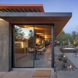 Doors, Exterior, Metal, and Sliding Door Type  Photo 4 of 12 in An Old Horse Barn Is Repurposed as a Chic Desert Guesthouse