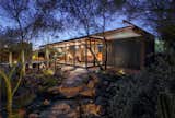 Outdoor, Desert, Front Yard, Walkways, Hardscapes, and Trees  Photo 12 of 12 in An Old Horse Barn Is Repurposed as a Chic Desert Guesthouse from Desktop