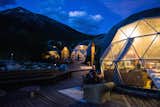 Outdoor, Decking Patio, Porch, Deck, Hardscapes, Large Patio, Porch, Deck, Wood Patio, Porch, Deck, Shrubs, Walkways, Boulders, Trees, Field, Woodland, and Slope  Photos from Soak Up the Magic of Patagonia at This Eco-Friendly Geodesic Dome Retreat