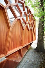 Exterior, Flat RoofLine, Prefab Building Type, Wood Siding Material, and Cabin Building Type  Photo 6 of 8 in This Prefab Backyard Pavilion Mimics a Dragonfly's Wings