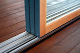 Weather-resistant thresholds are best for glass walls used as unprotected exterior doors.