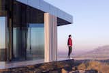 Exterior, Prefab Building Type, Flat RoofLine, Cabin Building Type, and Glass Siding Material The house is temporarily located 15 minutes by car from Gorafe village.  Photo 12 of 13 in Go Stargazing in This Off-Grid Glass Prefab Nestled in the Desert