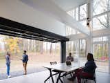 Doors, Exterior, Folding Door Type, and Metal Ample glazing blurs the distinction between indoors and out.

  Photos from A Shipping Container Prefab Lab Is Built in Only 4 Hours