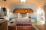 Living Room, Wall Lighting, Ceiling Lighting, End Tables, and Sofa The property is a quick 20-minute drive to downtown Joshua Tree.

  Photo 3 of 16 in Joshua Tree Is Now Home to a Chic Airstream Oasis—Featuring 4 Trailers Available to Rent
