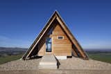 Silvertop Ash shiplap siding clads the facade. 