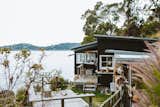 Exterior, Wood Siding Material, House Building Type, and Metal Roof Material The couple’s eco-friendly renovation process took 18 months.  Photo 1 of 11 in A 1920s Fisherman’s Shack in Australia Breathes New Life as a Cozy, Unique Rental