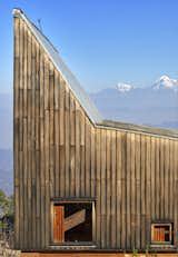 The exterior is cladded with tun timber, a wood that is native to the region.&nbsp;