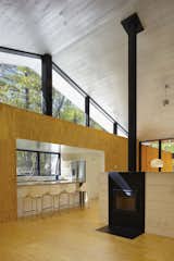 Clerestory windows bring in additional light and views of the forest canopy. 