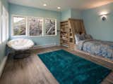 The northeast bedroom is built into Gyp Rock and comes with a handmade, white-oak built-in bed, as well as a private entrance to a small deck. 