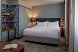 The standard King Room offers courtyard rooms and TRI-KES wallcovering. 