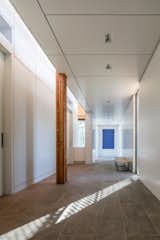 Hallway and Slate Floor The buildings were constructed with glulam columns and beams.   Photo 9 of 14 in This Elegant Californian Prefab Minimizes Site Disturbance
