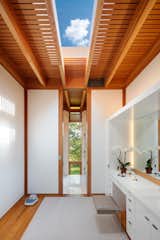 A large skylight lets ample light into the bathroom. 