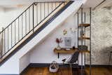 A small workspace now takes advantage of the cozy nook beneath the stairs.

