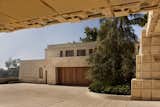 Exterior, Concrete Siding Material, and House Building Type A courtyard separates the main residence from the detached garage, and is topped with guest quarters, which was originally a chauffeur’s apartment.

  Photo 8 of 23 in Frank Lloyd Wright’s Iconic Ennis House Is Listed For $23M