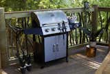 The hexagonal deck also features a classic five-burner gas grill to satisfy the guests' cookout needs.