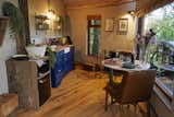 A look at the quaint kitchen and dining area. Complimentary staples are provided.