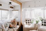 The couple added all new furniture, from the sofas and chairs to the lighting fixtures and curtains. To stay within budget, the larger furniture finds were either gifted, or purchased at secondhand stores.

  Photo 4 of 25 in Before & After: An Uninspired RV Gets a Cheery Refresh For $5K