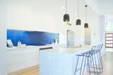 ‘White Attica’ complements the cool tones of this modern kitchen.