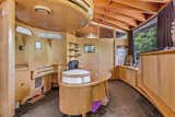 Office, Desk, Carpet Floor, Storage, and Chair The built-in office and broadcasting studio allowed Gleason to comfortably work from home.   Photos from Jackie Gleason’s Spaceship-Like Mansion Hits the Market For $12M