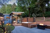 "The homeowners hoped to transform their lot into a unified, beautiful, indoor-outdoor oasis linking their home, yard, and a new backyard shed in a designed experience where every detail would come together to compose the many smaller sub-spaces into an integrated whole," notes the design firm.