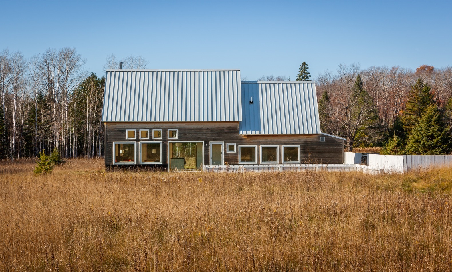 Farmhouse rustic large brown display barn with metal orders roof