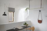 The minimalist furnishing selection helps maintain an airy, open feel throughout. 
