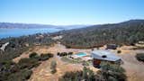 Perched high on a clearing, the Goto House overlooks views of the Napa County hills and Lake Berryessa. 