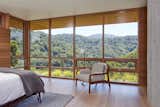 The master bedroom boasts spectacular south-facing views of the valley. 