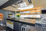 Spanish designer/architect Jorge Pensi designed the new Poggenpohl +MODO kitchen, which features honed granite countertops and high-end, fully integrated appliances.