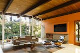 Living Room, Sofa, Coffee Tables, Chair, Terrazzo Floor, and Recessed Lighting The dark wood floors were replaced by light-colored terrazzo that gives the interiors a brighter feel.   Photo 1 of 43 in design by Wade Michael from Acclaimed Architect Risa Boyer Reinvents Indoor/Outdoor Living