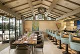 Formerly an aging dive bar, this acclaimed restaurant in Montecito, California, was transformed by AB Design Studio into an inviting and high-end eatery with a 20-foot-long custom accordion-style door system. 